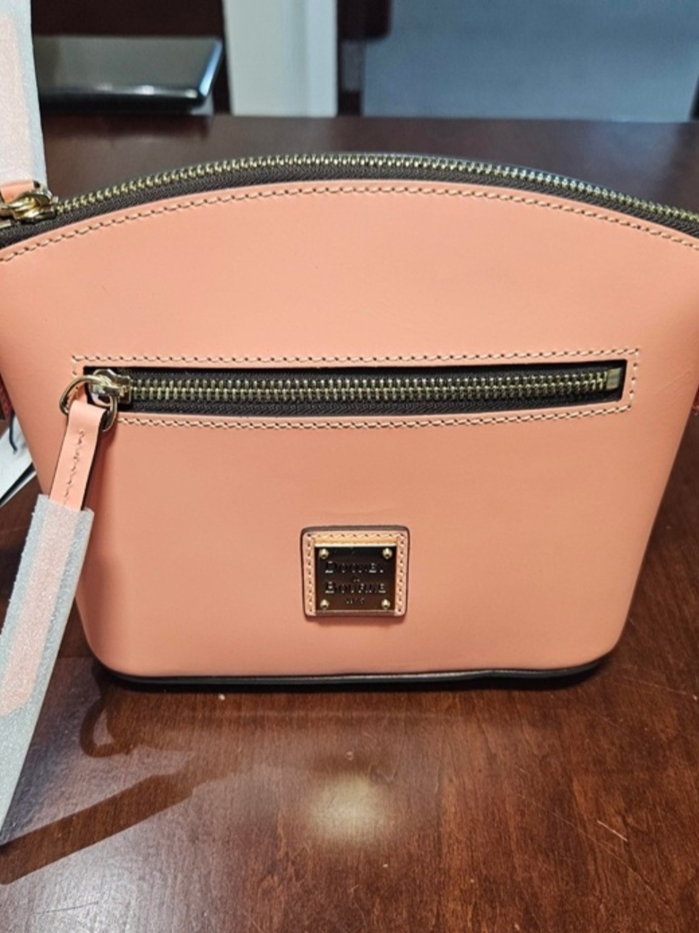 Dooney & Bourke Peach Leather Dome Crossbody with Gold Hardware